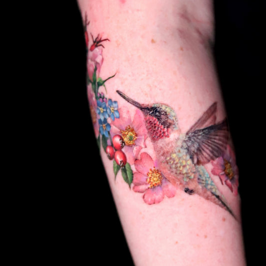 Hummingbird and rosehip